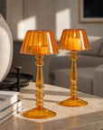 A Pair x 2 Orange/Yellow Lamp-Style Glass pillar or tealight candle holders