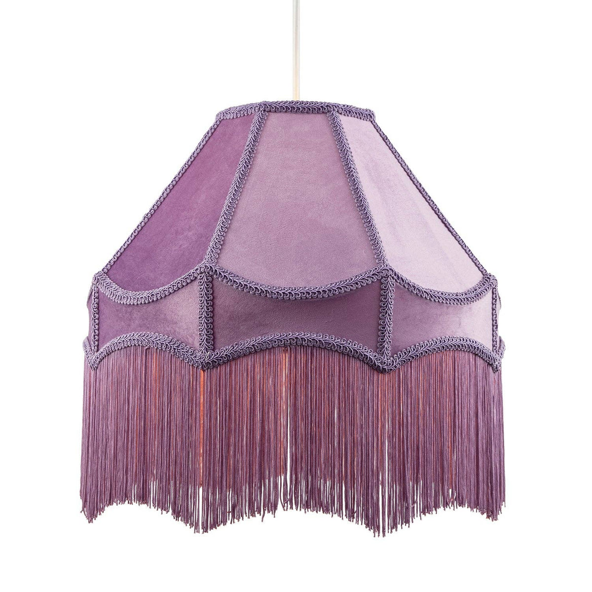 A purple fabric lampshade with scalloped edges and long fringe hanging from the bottom, suspended against a plain white background.