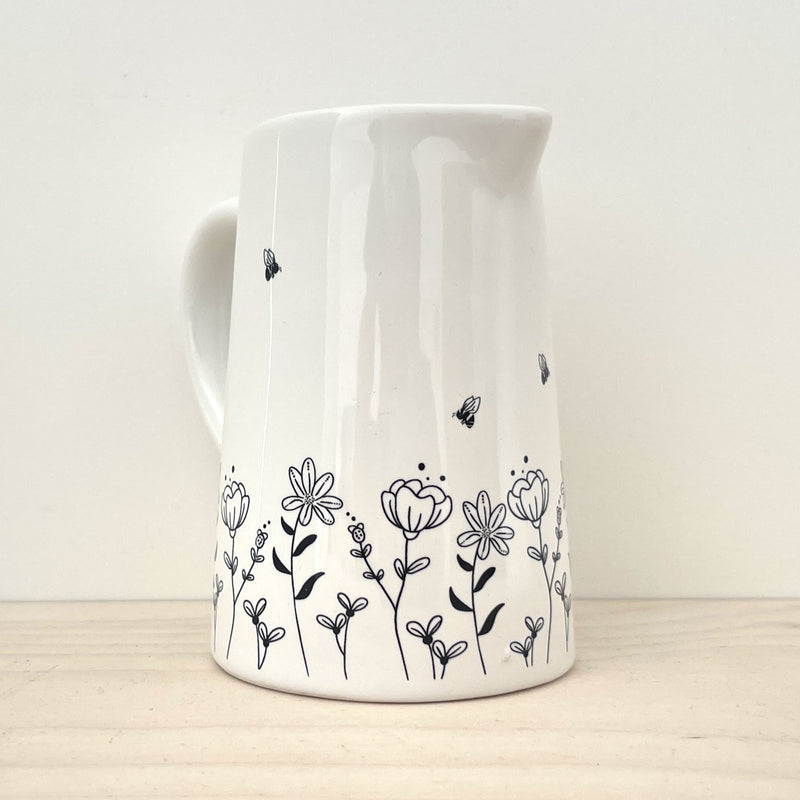 Bee and Flower Hand made milk and or gravy Jug crafted in a white ceramic finish