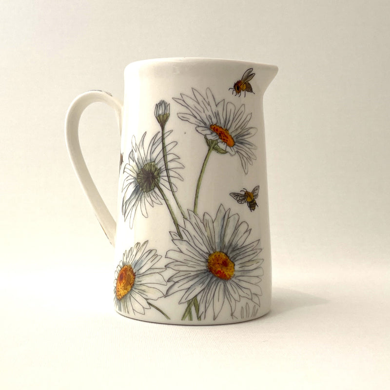 Bee and Daisy Hand made milk and or gravy Jug crafted in a white and flower ceramic finish