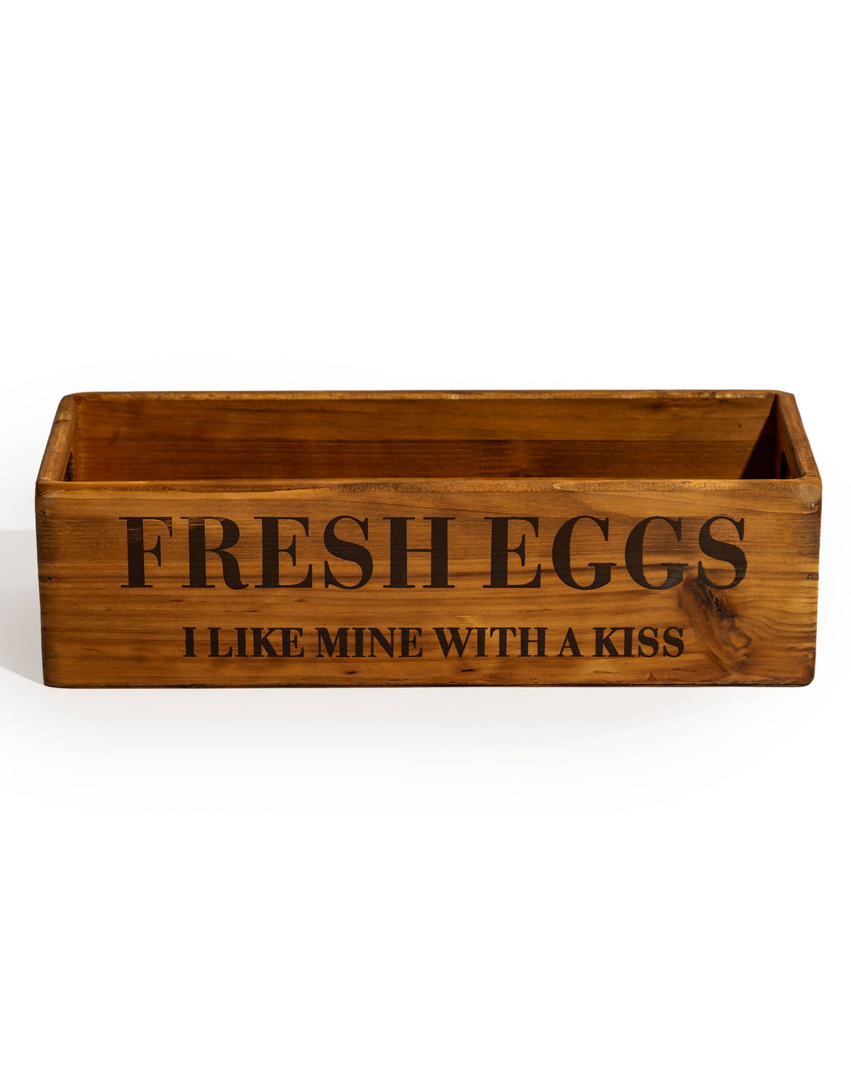 A rustic wooden rectangular box with the words 'FRESH EGGS' and 'I LIKE MINE WITH A KISS' printed on the front in black lettering, shown on a plain white background.