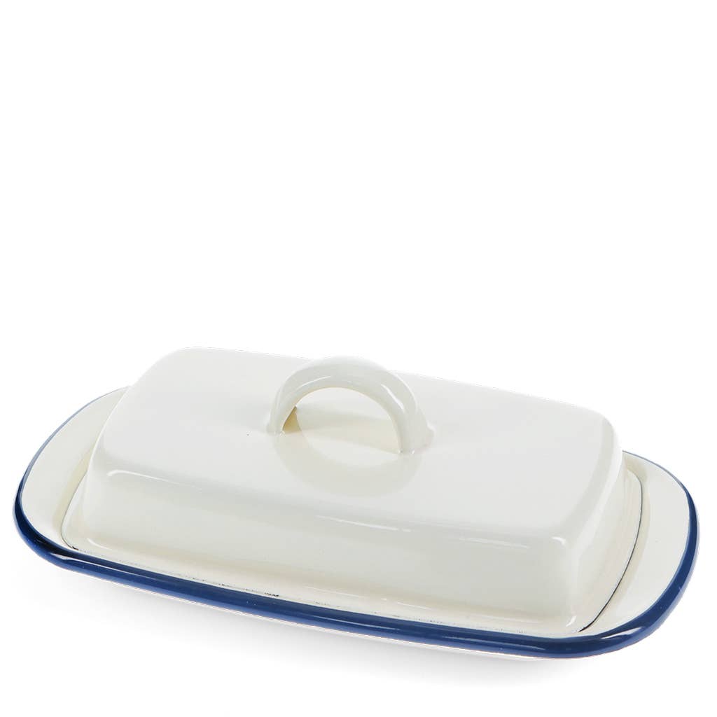 White butter dish with blue rim on a white background