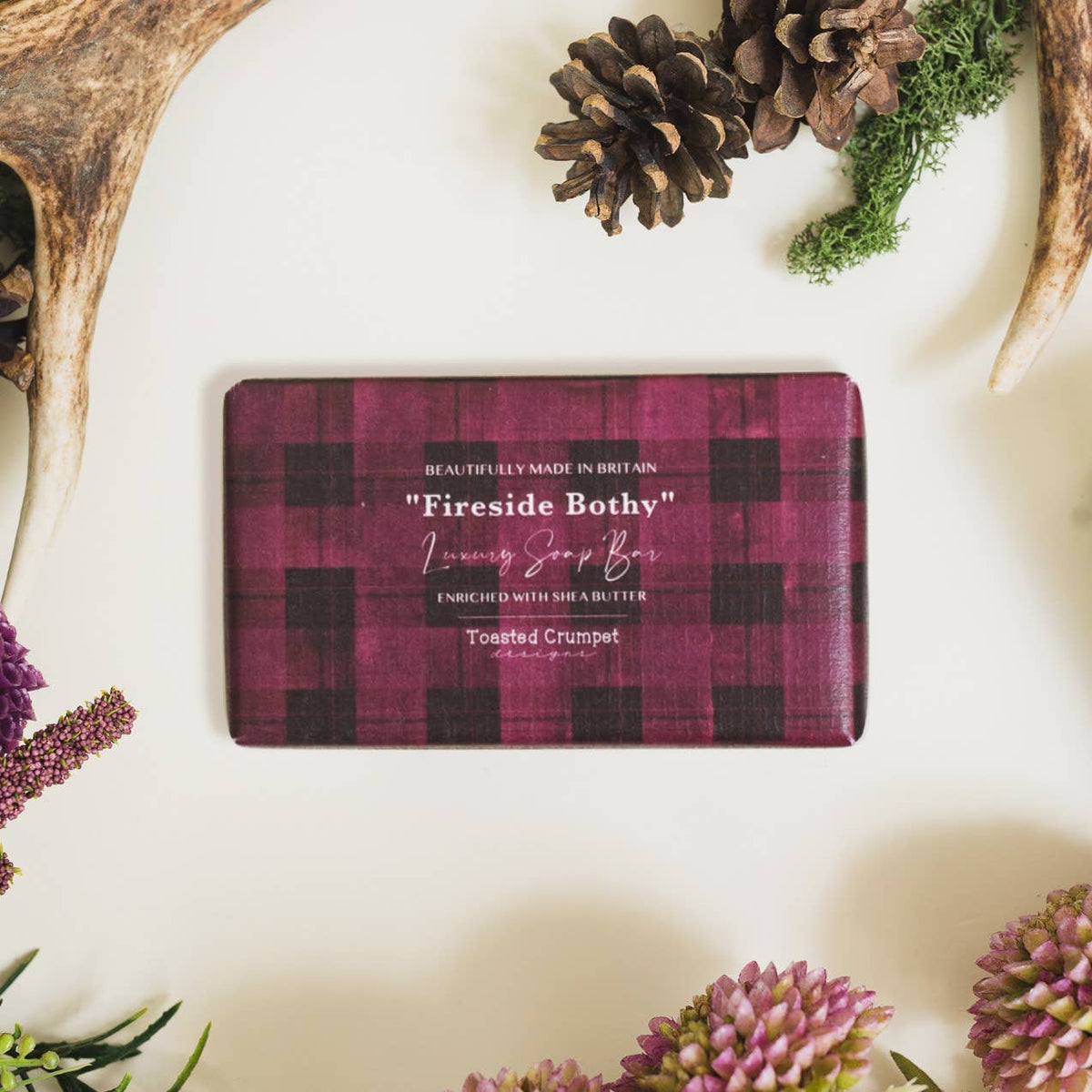 Fireside Bothy luxury soap bar in burgundy and black plaid packaging