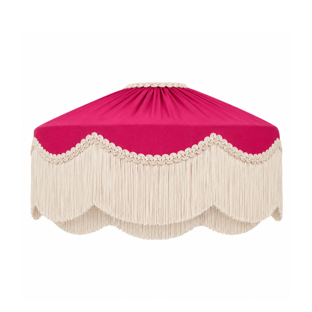 A round Lampshade with a vibrant magenta top and a long cream fringe, finished with a decorative scalloped lace trim, shown on a plain white background.