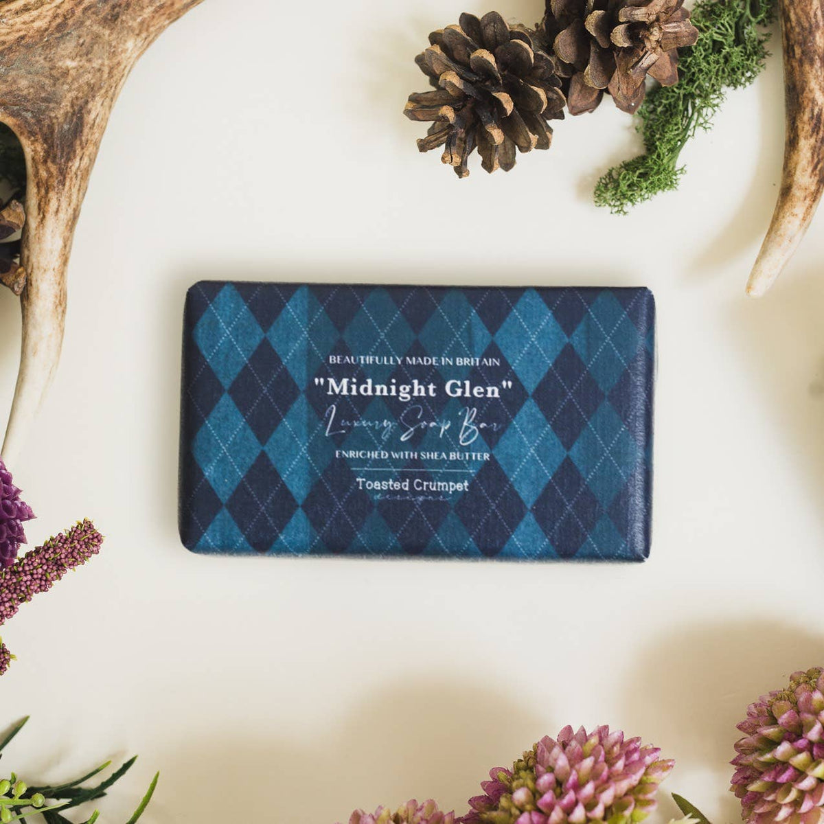 Midnight Glen luxury soap bar in navy blue diamond-patterned packaging
