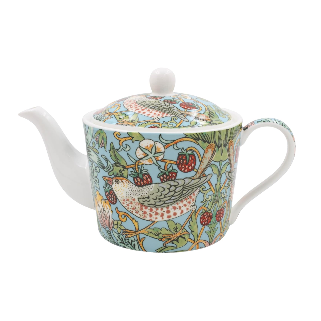 A white ceramic teapot decorated with a detailed botanical and bird pattern inspired by William Morris' style, featuring a light blue background, green leaves, red berries, and a bird in the centre.