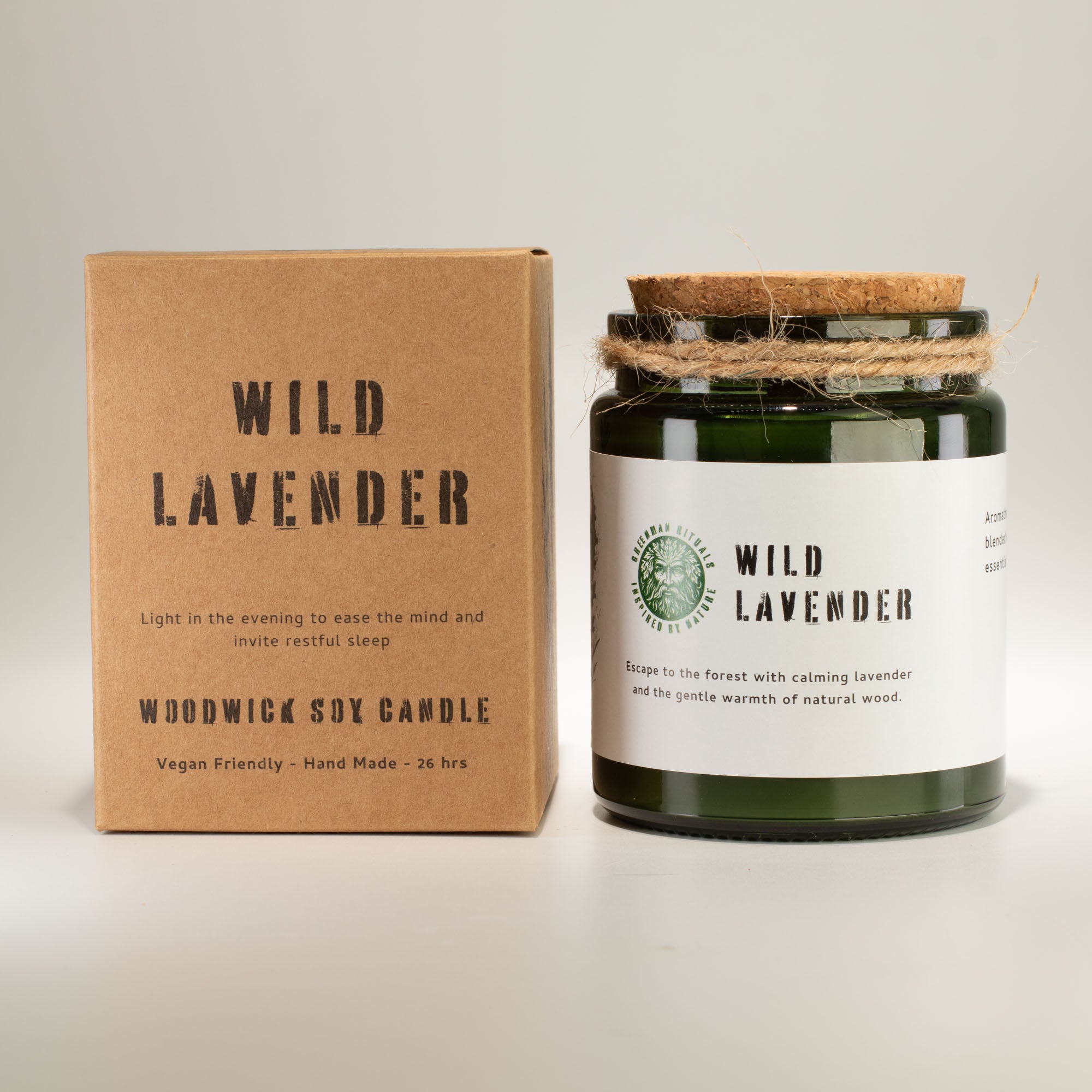 Woodwick Wild Lavender candle with packaging on a light gray background