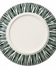 A round ceramic plate with a solid white center and a wide rim featuring a dark green and white abstract radial brushstroke pattern, shown from a top-down view on a white background.