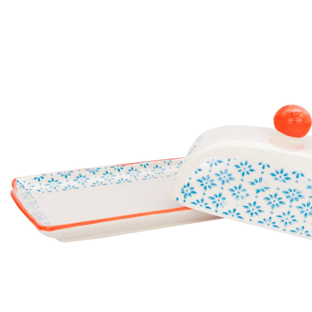 Decorative tray with floral pattern and red rim on a white background