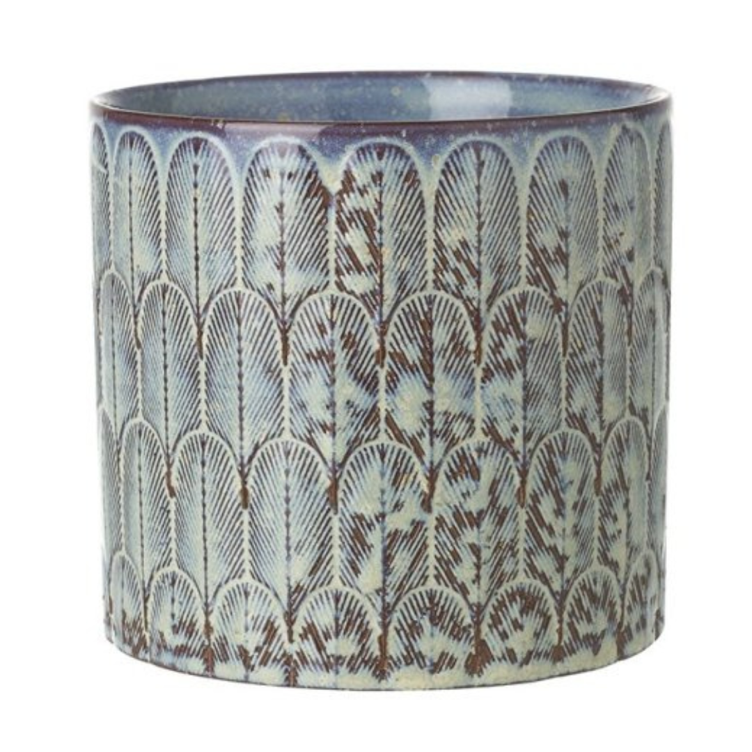 A cylindrical ceramic planter or vase with a textured, distressed pattern of repeating arches in dark brown over a light blue-gray and off-white glaze, shown against a plain white background.