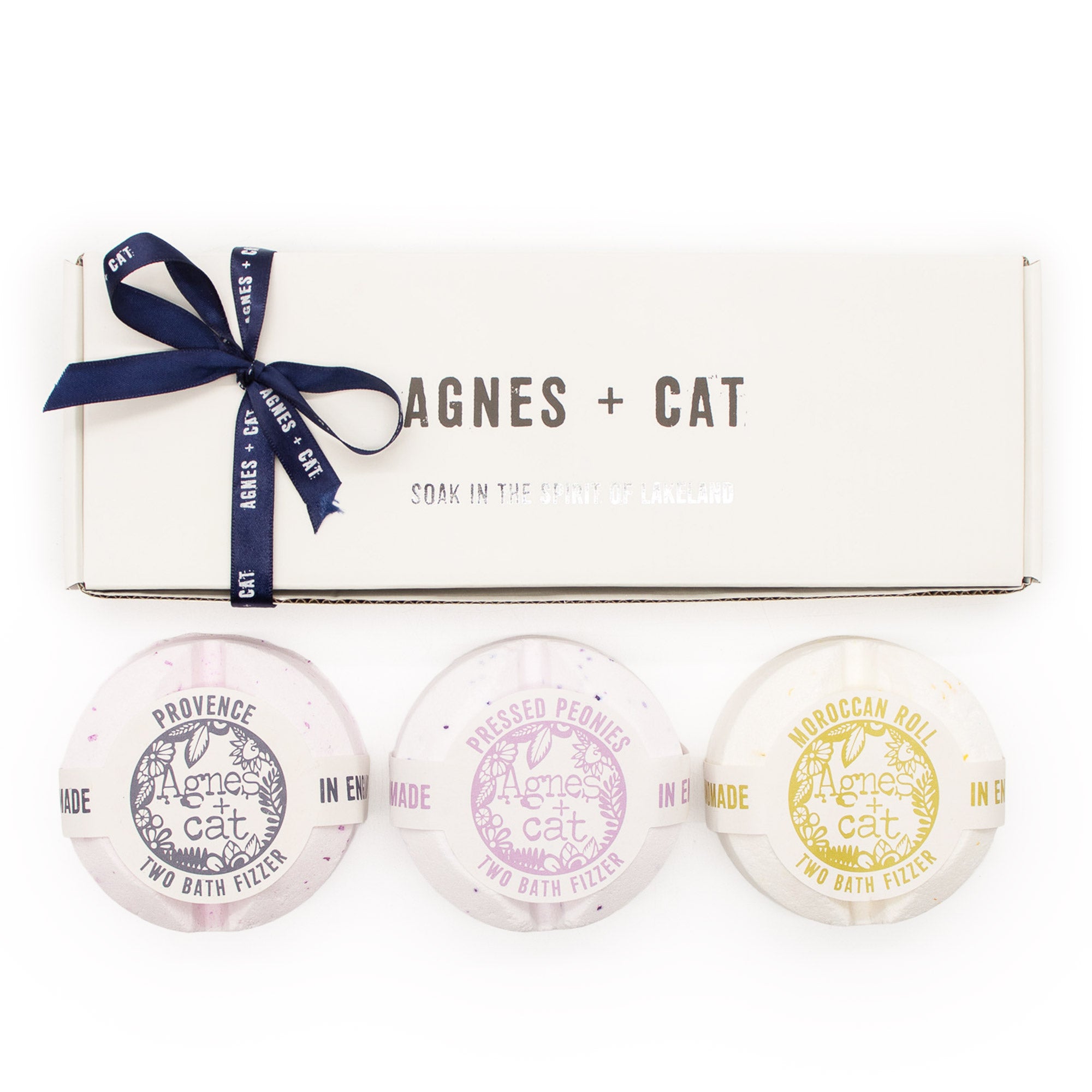 Set of three bath fizzers with 'agnes + cat' branding on a white background