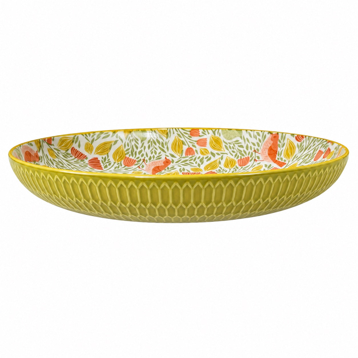 A wide, shallow ceramic bowl with a textured yellow exterior and a white interior decorated with a colorful botanical pattern of orange, yellow, and green leaves.
