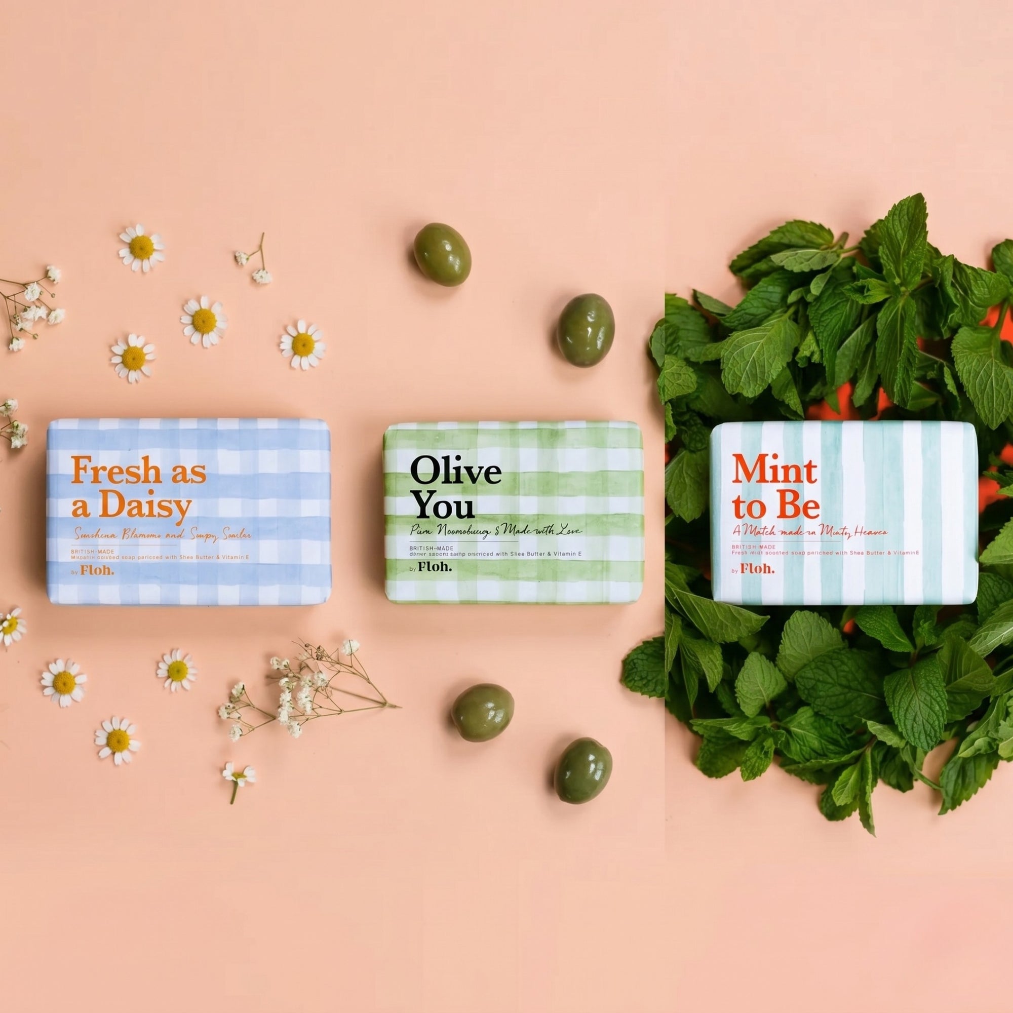 Three small boxes labeled 'Fresh as a Daisy', 'Olive You', and 'Mint to Be' on a pink background with greenery and flowers.