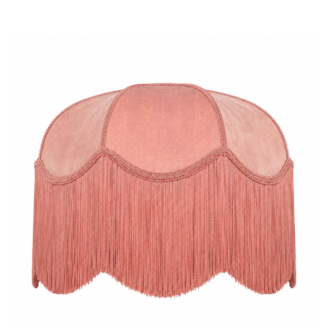 A dusty pink velvet dome-shaped lampshade with a scalloped fringe hem, shown against a plain white background.